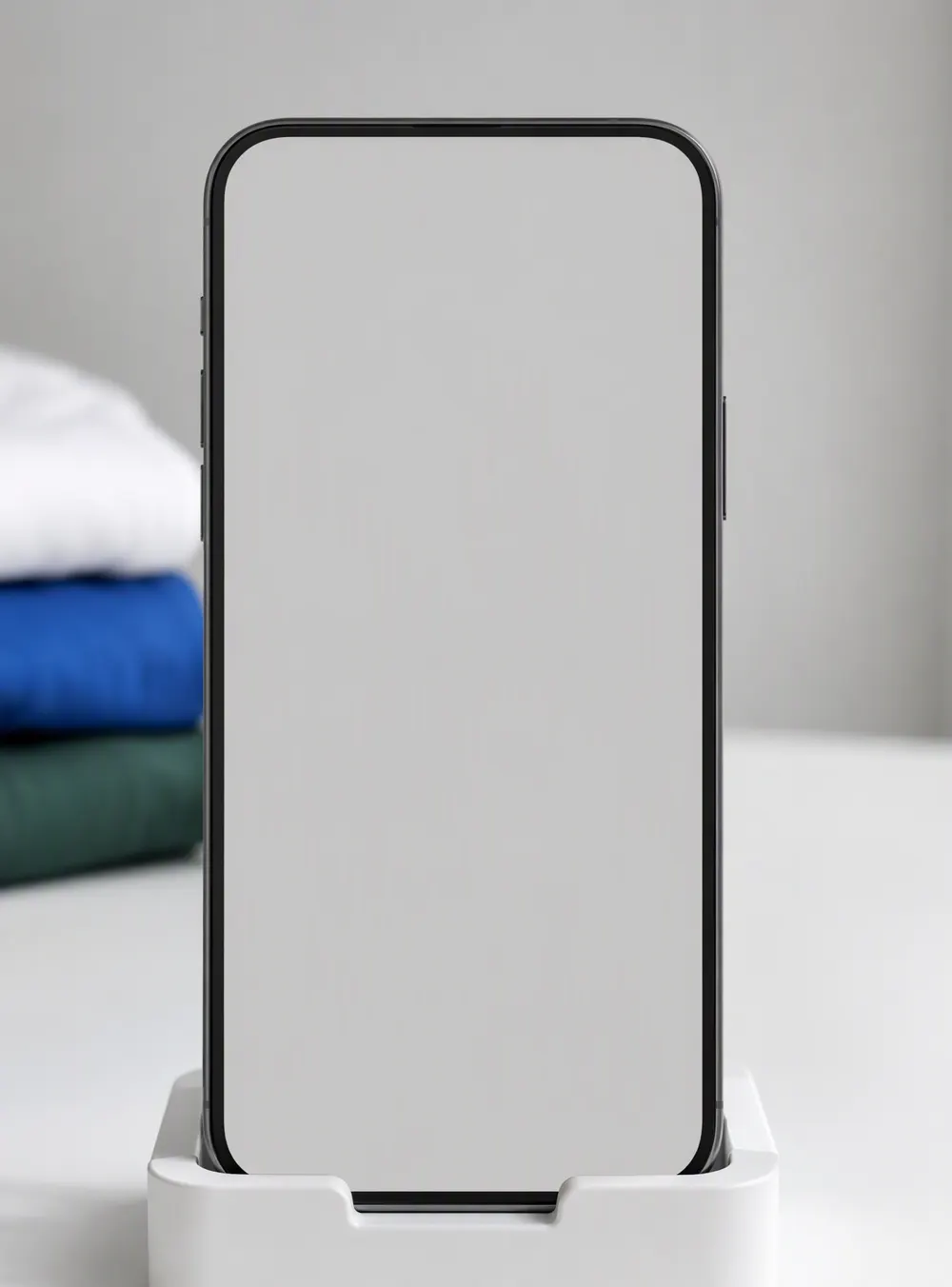 A phone on a stand showing a checkout with a discount code applied