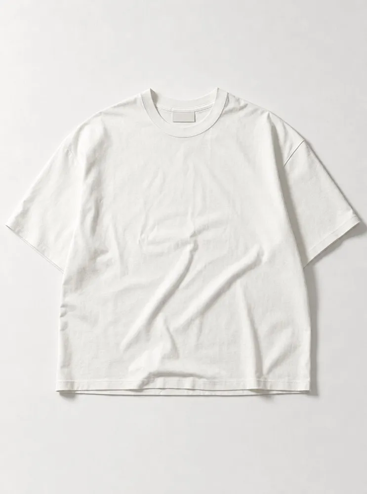 The Heavyweight Tee in Chalk, laid flat